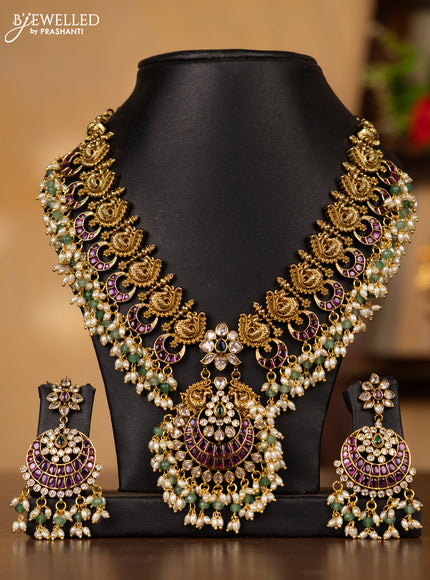 Antique guttapusalu necklace floral & double peacock design in multicolor kemp stones and pearl hangings