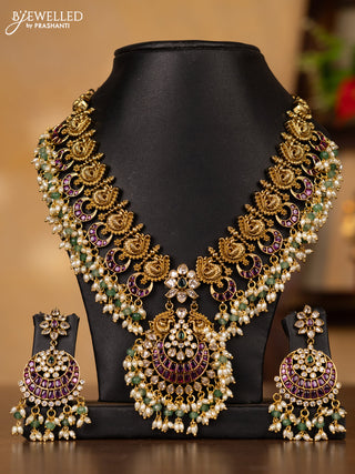Antique guttapusalu necklace floral & double peacock design in multicolor kemp stones and pearl hangings