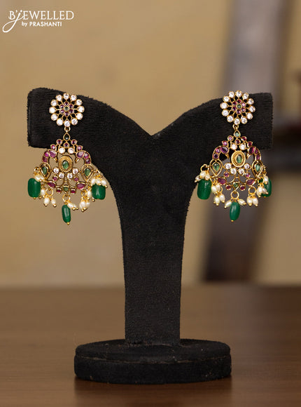 Antique Guttapusalu Haaram with double peacock pendnat and floral design in multicolor kemp stones and rice pearl hangings