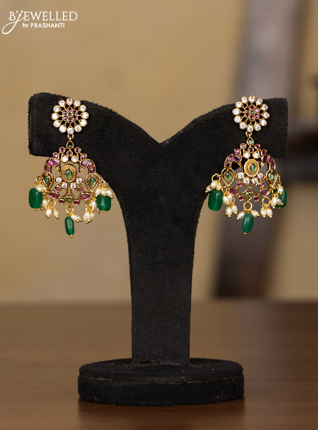 Antique Guttapusalu Haaram with double peacock pendnat and floral design in multicolor kemp stones and rice pearl hangings