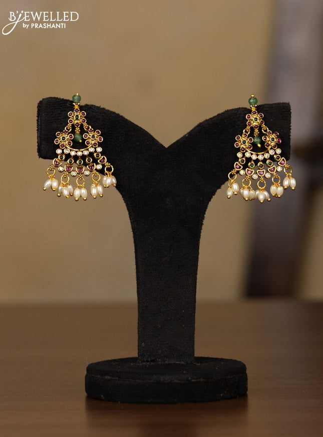Antique Guttapusalu Haaram with floral design in multicolor kemp stones and rice pearl hangings
