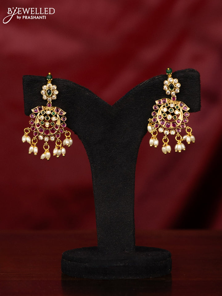 Antique Guttapusalu Haaram with peacock pendnat and floral design in multicolor kemp stones and rice pearl hangings