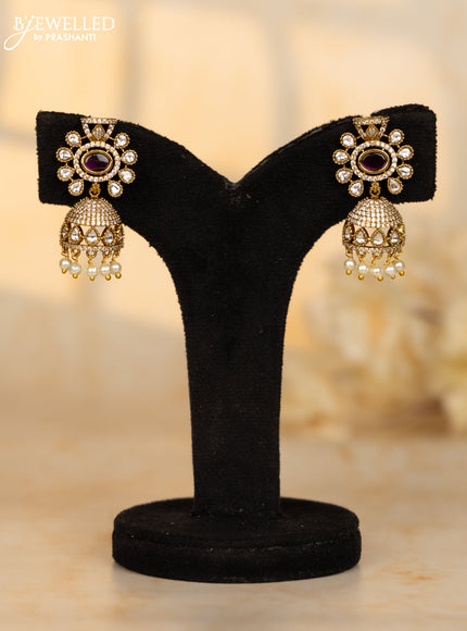 Antique jhumkas with ruby and kundan cz stones in pearl hangings