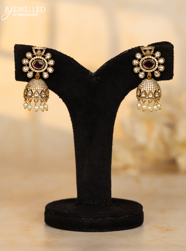 Antique jhumkas with ruby and kundan cz stones in pearl hangings