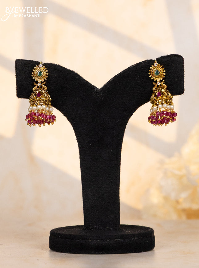 Antique jhumkas with kemp and cz stones in pink beads hangings