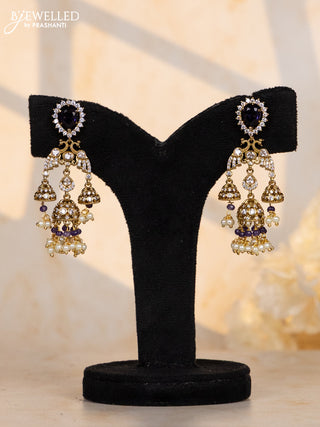 Antique jhumkas double peacock design with purple and cz stones in pearl hangings