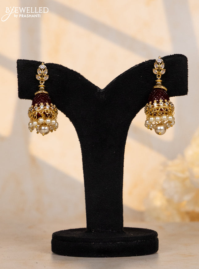 Antique multicolour changable jhumkas with leaf design and cz stones in pearl hangings