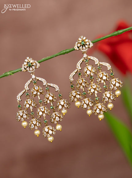 Antique earrings with emerald and cz stones in pearl hangings