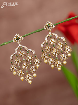 Antique earrings with emerald and cz stones in pearl hangings