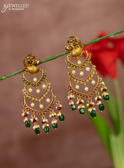 Antique earrings peacock design with kemp & cz stones in pearl & green beads hangings