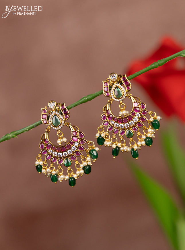 Antique earrings with kemp & cz stones in pearl & green beads hangings