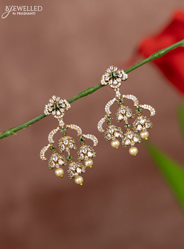Antique earrings with green kemp and cz stones in pearl hangings