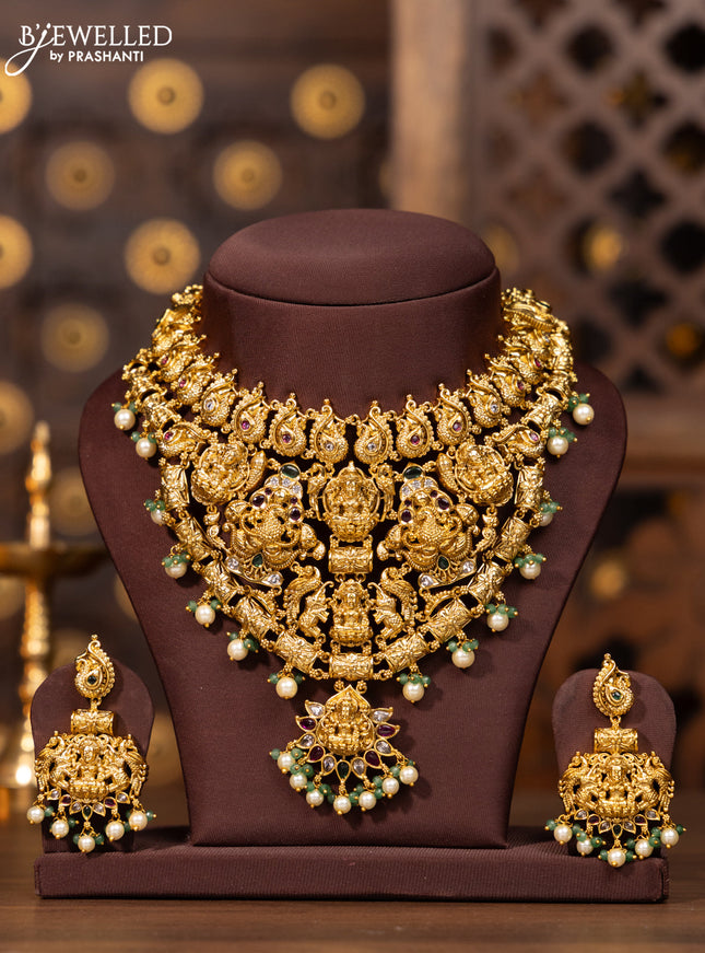 Antique necklace lakshmi design in kemp stones and pearl hanging