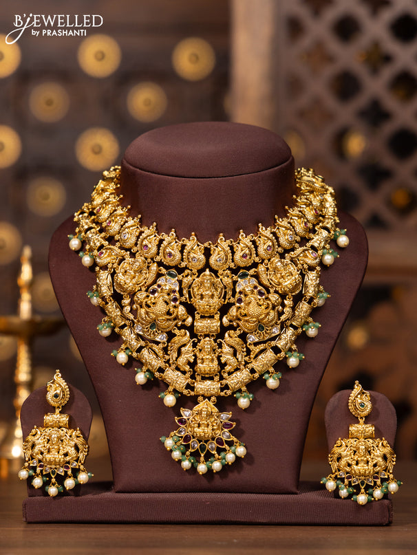 Antique necklace lakshmi design in kemp stones and pearl hanging
