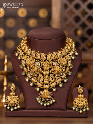 Antique necklace lakshmi design in kemp stones and pearl hanging