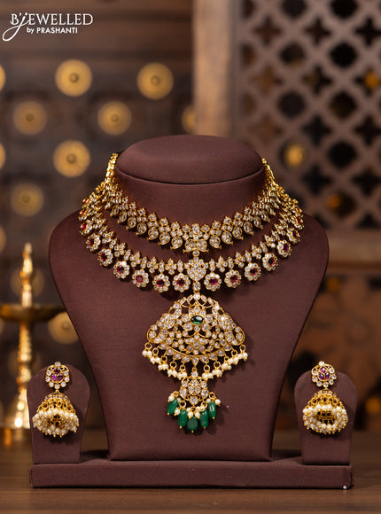 Antique necklace lakshmi deisgn in white and red stone and green beads hanging