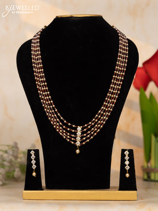 Beaded necklace orangish brown beads with alternate pearls and  multicolor stone pendants