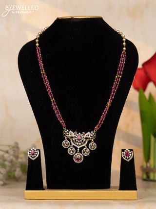 Baeded necklace with half pink beads and pearls with cz stone pendant
