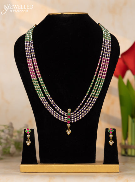 Beaded necklace with multicolor beads and jadau pendant at the center