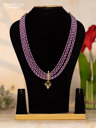 Beaded lavender necklace with multicolor stone pendant at the center