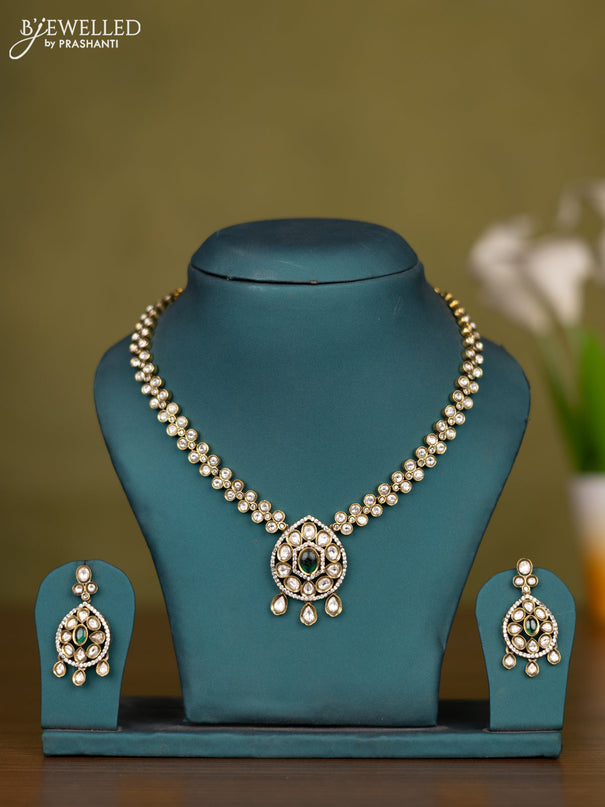 Necklace with emerald & kundan cz stones and hangings in victorian finish