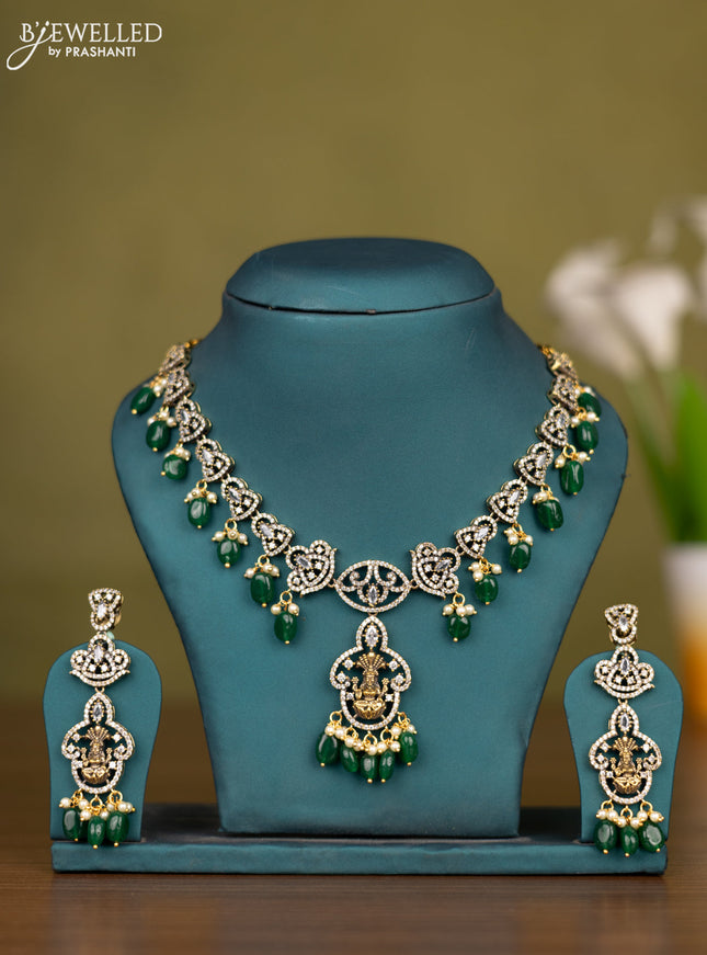 Necklace lakshmi design with cz stones and pearl & green beads hangings in victorian finish