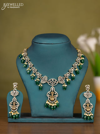 Necklace lakshmi design with cz stones and pearl & green beads hangings in victorian finish