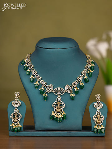 Necklace lakshmi design with cz stones and pearl & green beads hangings in victorian finish
