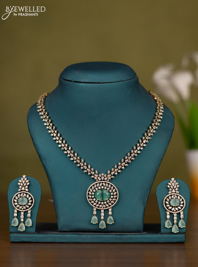 Necklace with mint green & cz stones and hangings in victorian finish