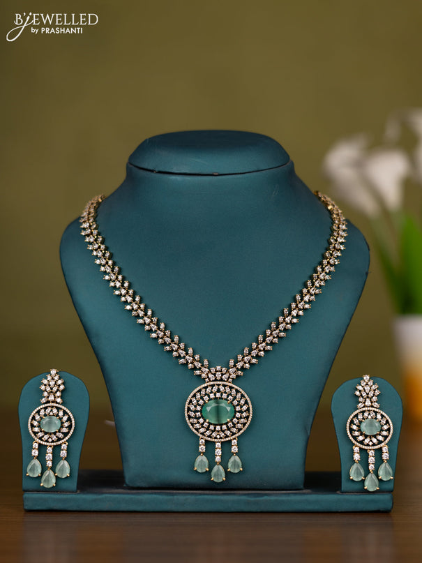 Necklace with mint green & cz stones and hangings in victorian finish
