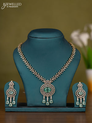 Necklace with mint green & cz stones and hangings in victorian finish