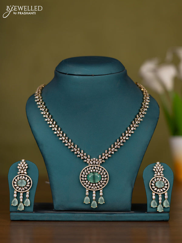 Necklace with mint green & cz stones and hangings in victorian finish