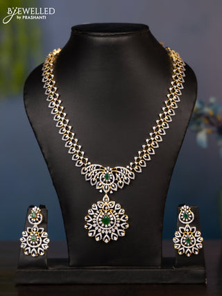 Zircon necklace tear drop deisgn with cz and green stones in gold finish
