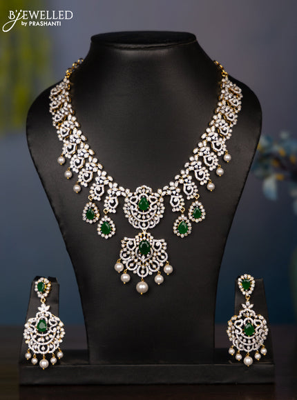 Zircon necklace tear drop deisgn with cz and green stones in gold finish