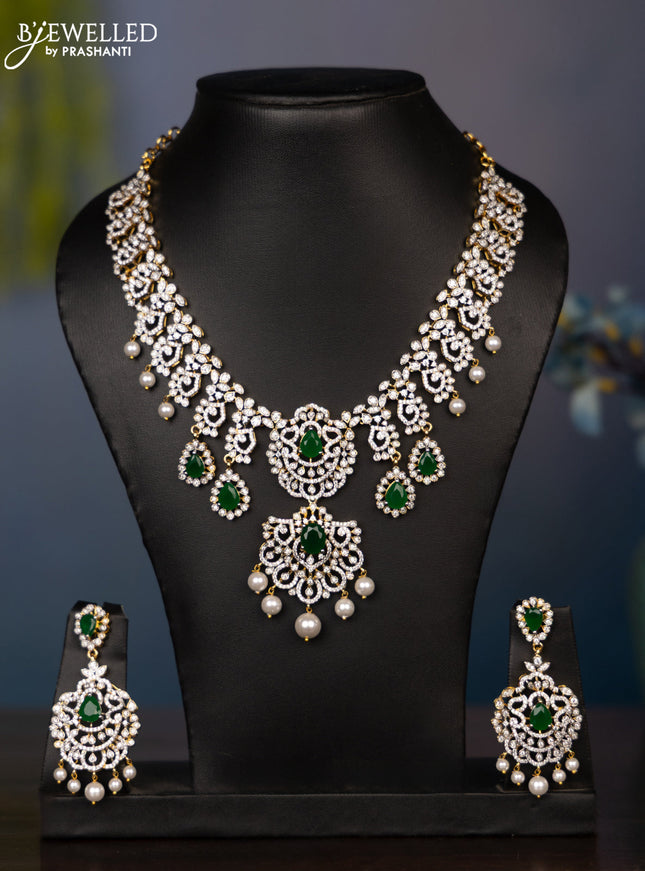 Zircon necklace tear drop deisgn with cz and green stones in gold finish