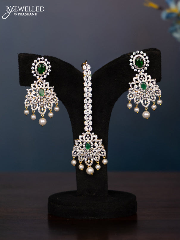 Zircon necklace leaf deisgn with cz and green stone with maang tikka in gold finish