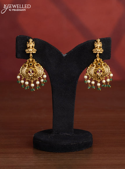 Antique big choker lakshmi & peacock design with kemp and kundan stones in pearl hangings