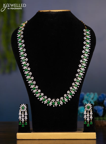 Zircon haaram with emerald and cz stones in gold finish
