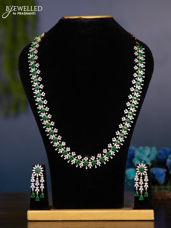 Zircon haaram with emerald and cz stones in gold finish