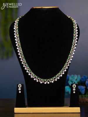 Zircon haaram with emerald and cz stones in gold finish