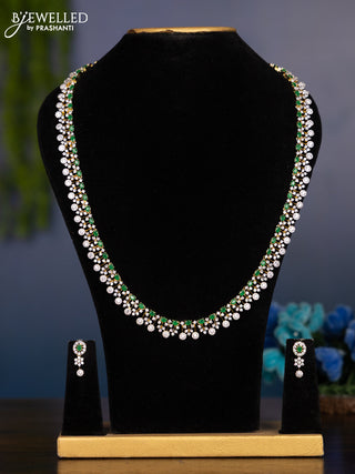 Zircon haaram with emerald and cz stones in gold finish