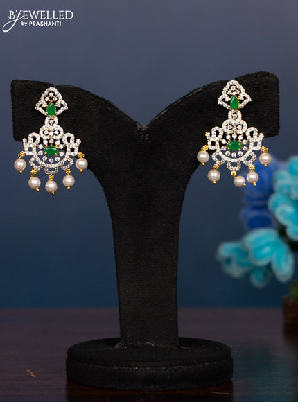 Zircon haaram with emerald & cz stones and pearl hangings in gold finish