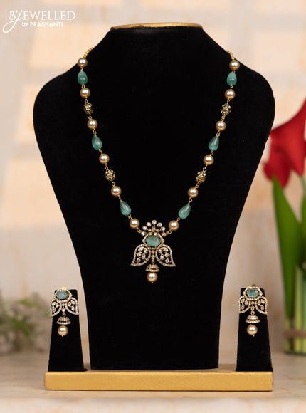 Beaded mint green necklace with cz stones and pearl hanging in victorian finish