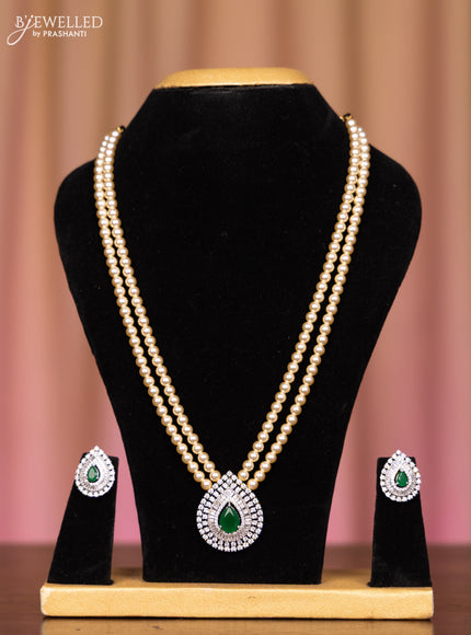 Pearl double layer necklace with emerald and cz stones
