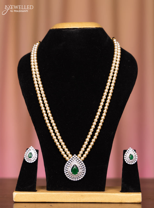 Pearl double layer necklace with emerald and cz stones