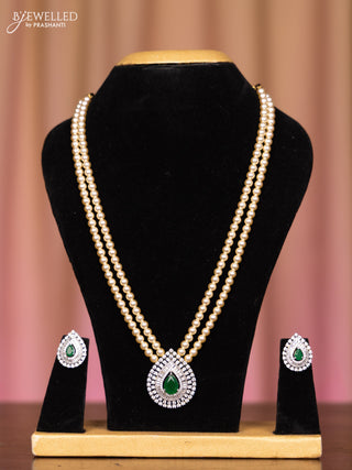Pearl double layer necklace with emerald and cz stones