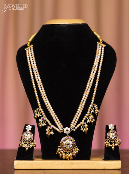 Pearl triple layer necklace with kemp and cz stones in pearl & golden beads hangings