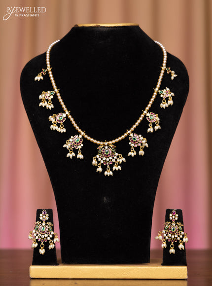 Pearl necklace with kemp and cz stones in pearl hangings