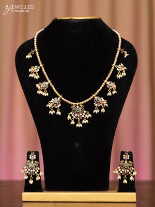 Pearl necklace with kemp and cz stones in pearl hangings