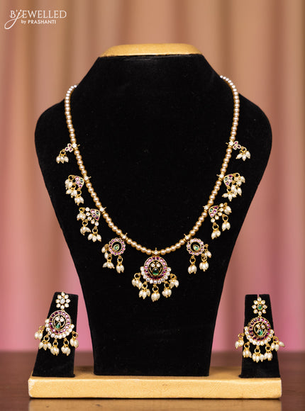 Pearl necklace with kemp and cz stones in pearl hangings